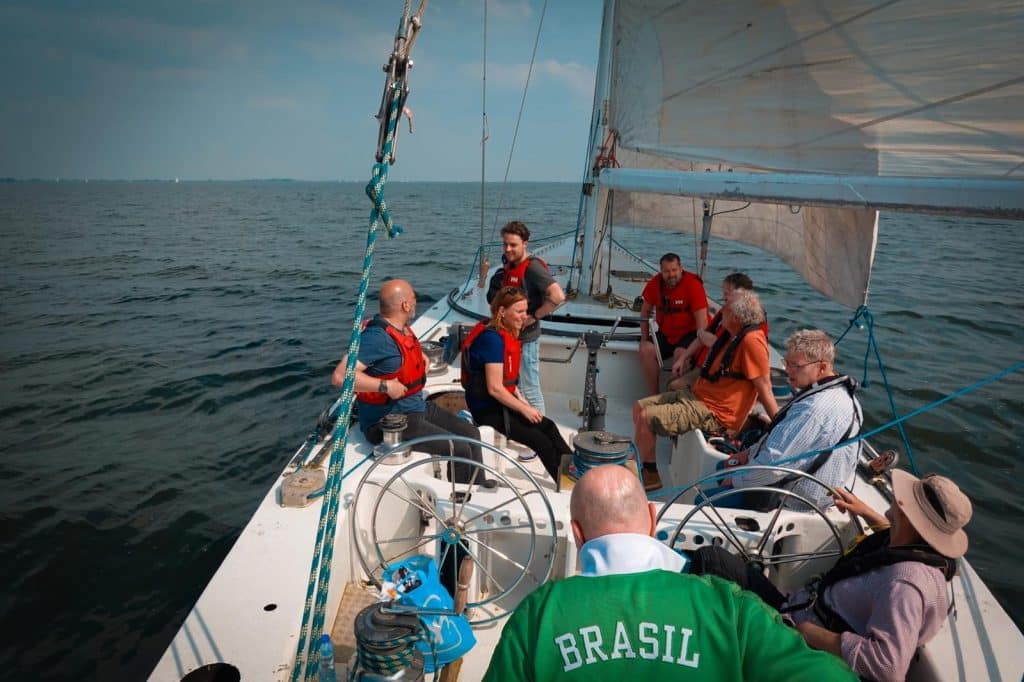 Michael en de andere clienten op de zeilboot